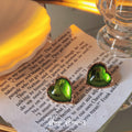 Gold Green Glass Heart Stud Earrings Textured Gold Rim view 1