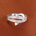 Abstract Heart And Ribbon Clear Stone Ring In Silver Tone view 3
