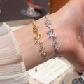 Crystal Butterfly Flower Chain Bracelets Gold and Silver view 1