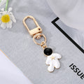 Gold and Silver Tone Assorted Symbol and Character Clip Keychains view 2