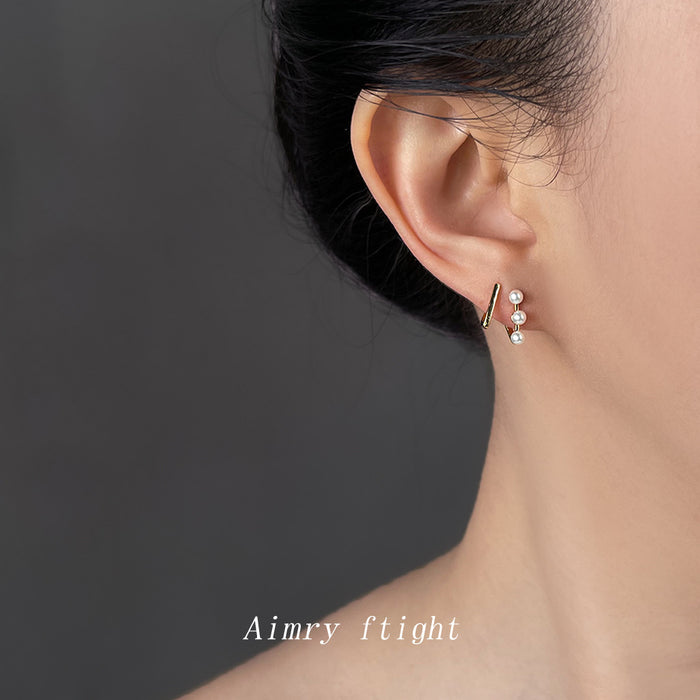 Gold-Tone Curved Bar Triple White Pearl Stud Earrings