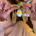 Long Metallic Tassel Drop Earrings in Gold and Silver Tones view 2