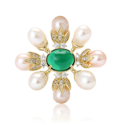 Gold pearl flower brooch with green cabochon center front view