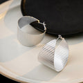 Gold and Silver Wide Corrugated Statement C Hoop Earrings view 7
