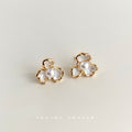 Gold White Three Petal Flower Stud Earrings With Pearl Centers view 1