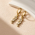 Crystal Leaf Cluster Hoop Earrings in Gold and Silver Tone view 4
