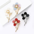 Four Petal Flower Brooch In Four Colorways With Polished Metal Detail view 4
