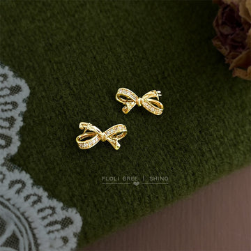 Gold Bow Stud Earrings Clear Pave Stones Star Cutouts