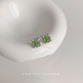 Silver Rectangular Green Crystal Stud Earrings Hammered Frame view 1