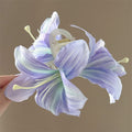 Oversized Lily Flower Hair Claw In Champagne Pink Purple Or Blue view 8