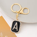 Rhinestone Initial Letter Keychain Black Enamel Gold Tone Tag view 6