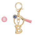 Gold Tone Initial Letter Keychain with Evil Eye and Pink Tassel view 7