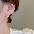 Crystal Bow Stud Earrings with Detachable Back Drop Detail view 3