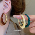 Gold Tone Open Hoop Earrings in White and Teal Jewelry view 1