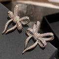 Pave Ribbon Bow Statement Stud Earrings Silver Tone view 2