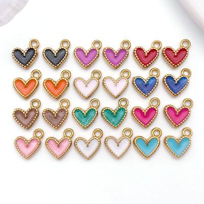 Colorful heart charms arranged on a light background