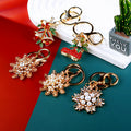 Christmas Snowflake Keychains in Pearl Crystal Gold and Silver Designs view 2