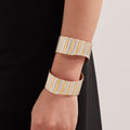 Broad Wavy Open Cuff Bracelet in Polished Gold Tone view 4