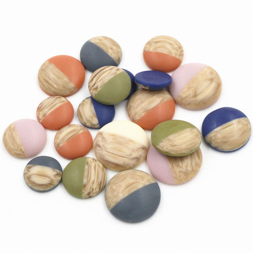 Wood grain cabochons showing assorted shapes and finishes