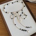 Beaded Bow Tie Necklace With Star Charms In Two Colorways view 6