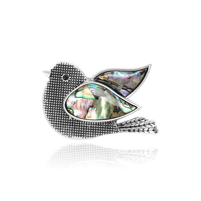 Main front view of Silver Tone Dove Brooch With Iridescent Shell Wing