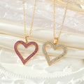 Gold Tone Bright Red Crystal Open Heart Pendant Necklace view 1