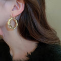 Gold Tone Textured Open Hoop Earrings with Polished Metal Finish view 4
