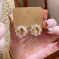 Radiant Crystal Halo Stud Earrings With Polished Metal Tone Details view 3