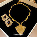 Gold Tone Textured Shield Necklace And Red Teardrop Square Earrings view 1