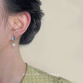 Gold Tone Pale Blue Oval Cat Eye And Baroque Pearl Stud Earrings view 2