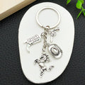 Antique Silver Western Hat Boot and Pistol Keychain Pair view 4