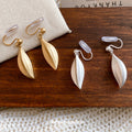 Matte Leaf Drop Clip Earrings in Gold and Silver Tones view 4