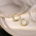 Gold Twisted Geometric Oval Crystal Inlay Hoop Earrings view 1