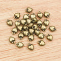 Small Three-Dimensional Heart Alloy Charms in Two Finishes view 6