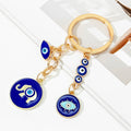 Navy Enamel Evil Eye Elephant Charm Keychain With Heart Accent view 2