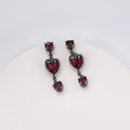 Black Tone Triple Red Faceted Heart Cascade Earrings view 4