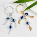 Evil Eye Beaded Tassel Keychain with Leaf Charm Accents view 1