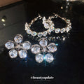Crystal Flower Studs and Stone Set Hoop Earrings with Metal Settings view 1