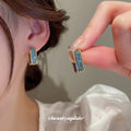 Green Crystal Geometric Hoop Earrings With Polished Metal Tone Details view 2