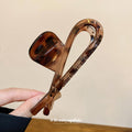 Deep Brown Translucent Tortoiseshell Long Loop Hair Claw view 2