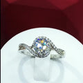 Silver Tone Twisted Halo Solitaire Ring with Polished Metal Finish view 2