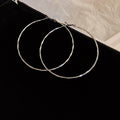 Round Hoop Earrings in Assorted Textures and Sizes view 5