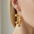 Graduated Metal Ball Cluster Drop Earrings in Polished Gold Tone view 4
