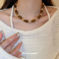 Brown Translucent Oval Bead Necklace Gold Metal Accents view 3