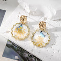 Gold Tone Scalloped Round Pressed Flower Resin Stud Earrings view 2