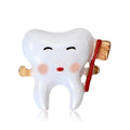 Enamel Tooth Brooch Holding Toothbrush Red or Blue Handle view 1