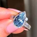 Aqua Pear-Shaped Solitaire Baguette-Side Ring Silver Tone view 1