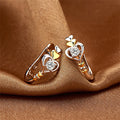 Two Tone Heart Huggie Earrings Silver Gold Clear Stone view 4