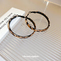 Leopard Print and Solid Oversized Hoop Earrings in Seven Styles view 3