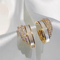 Gold Tone White Enamel Pink Stone Layered Huggie Earrings view 1